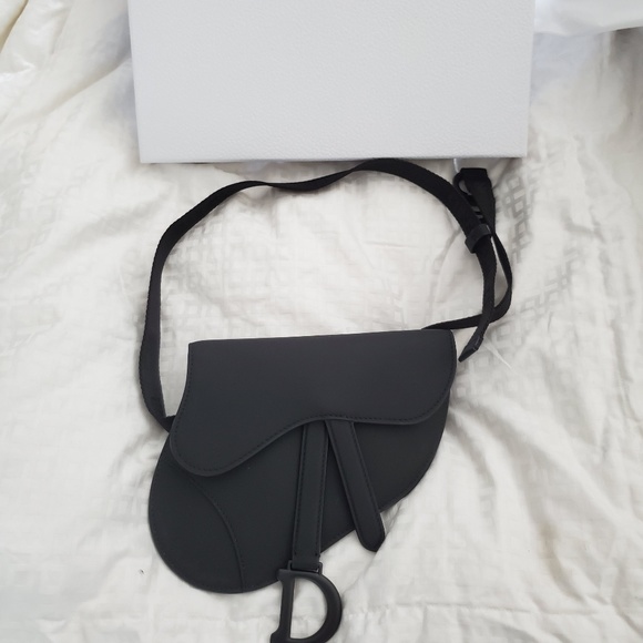 dior saddle calfskin clutch